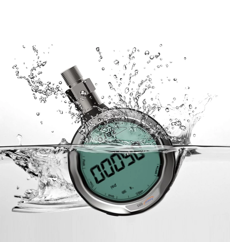 ADT685 digital pressure gauge submerged in water. Gauge pressure displayed on the screen. Stainless steel casing, rugged design.