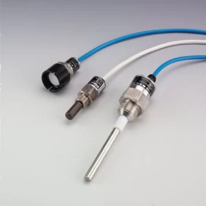 CPS-24 capacitance proximity switch. Industrial proximity sensors with metal housings and blue/white cables, used for non-contact detection.