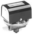 FS1 Series high sensitivity liquid flow switch. Industrial flow sensor with a black enclosure and metallic base for fluid monitoring applications.